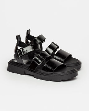 Sandalia Nina de caña media en efecto piel