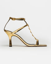 Sandalias altas Goldie en piel metalizada