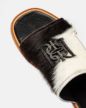 Monograma plano en pelo